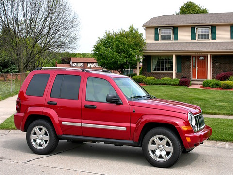 2006 Jeep Liberty Limited in Front of House Inferno Red ...